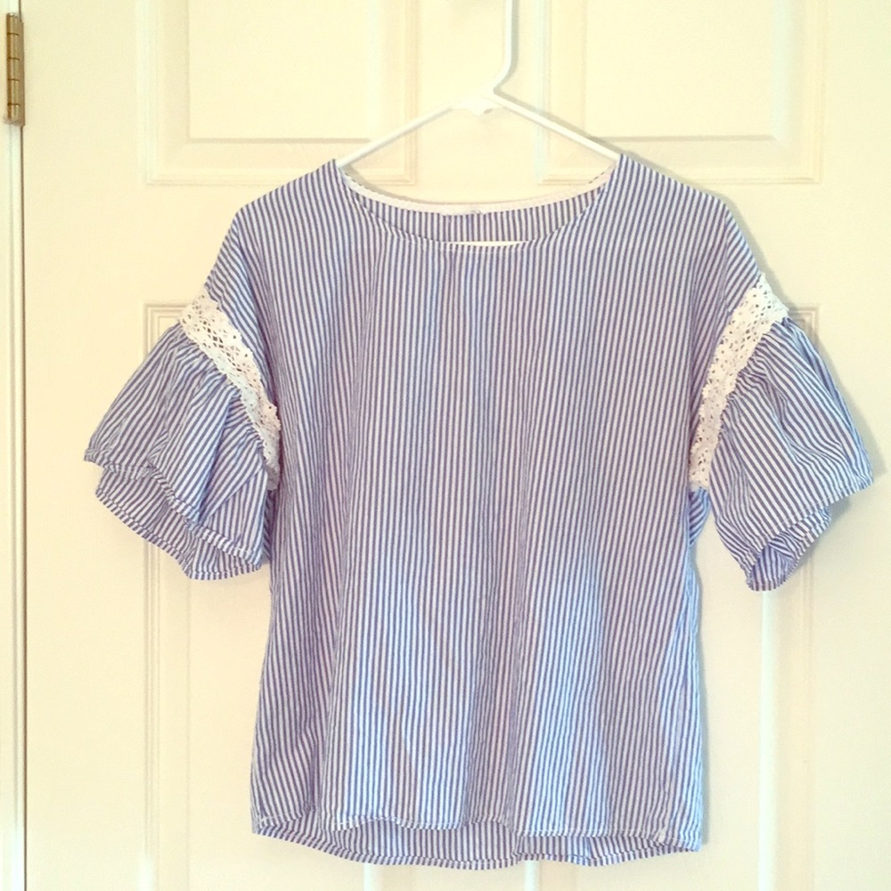 Blue and white striped top with flared sleeves